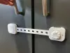 Baba biztonsági szalagos zár, fehér - 6db